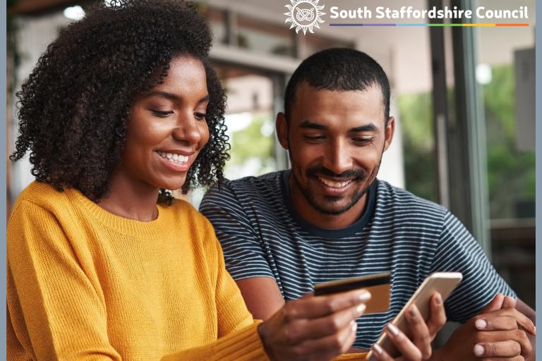 Couple completes online transaction using mobile phone