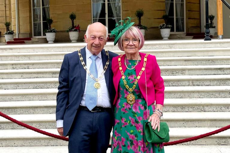 Councillor Meg Barrow, right, with her consort Adrian Hill at the Buckingham Palace Garden Party