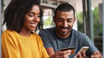 Couple completes online transaction using mobile phone