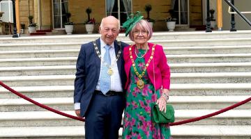 Councillor Meg Barrow, right, with her consort Adrian Hill at the Buckingham Palace Garden Party