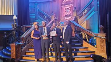 L-R: Former BBC presenter Sarah Travers, with South Staffordshire Council's Andy Aston and Mark Moore, and a representative of the award sponsor