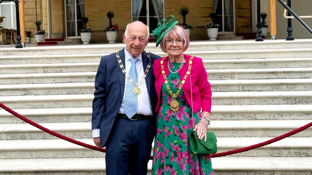 Councillor Meg Barrow, right, with her consort Adrian Hill at the Buckingham Palace Garden Party