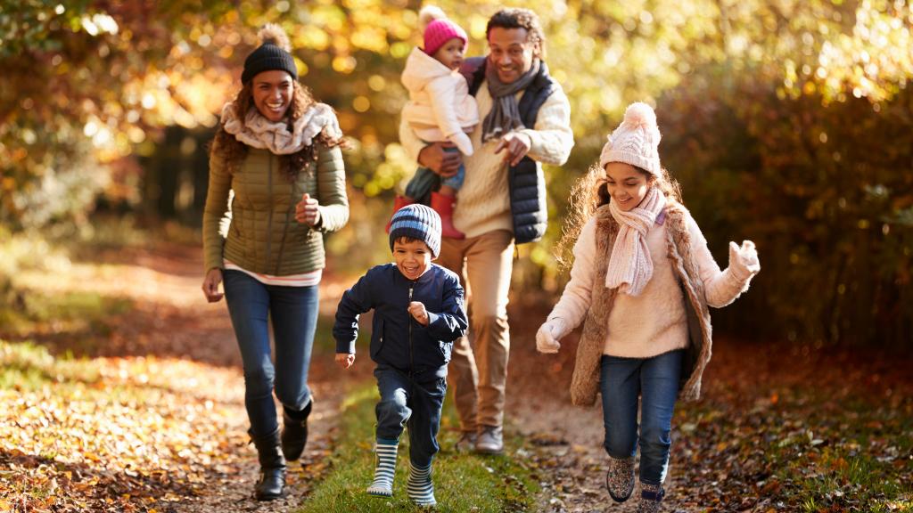 Family pictured outdoors