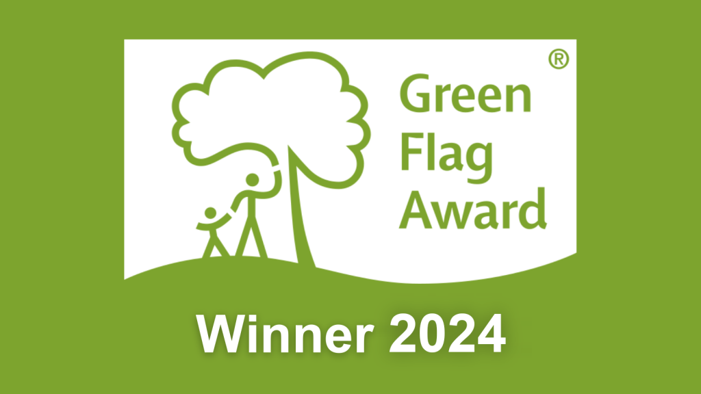 Green background with white Green Flag Award Winner 2024 logo
