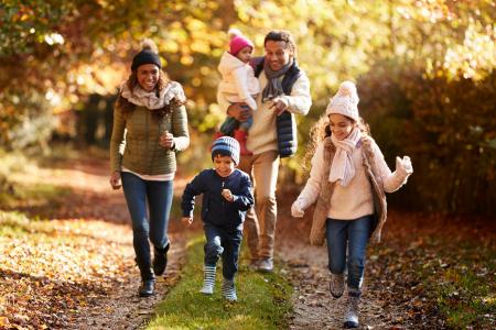 Family pictured outdoors